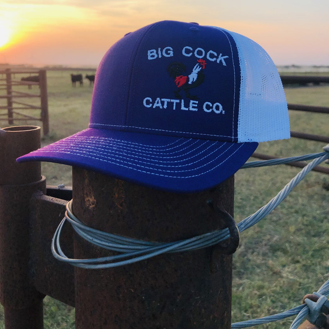 Adjustable Snapback Trucker hat with signature Big Cock Cattle Co logo Purple/White